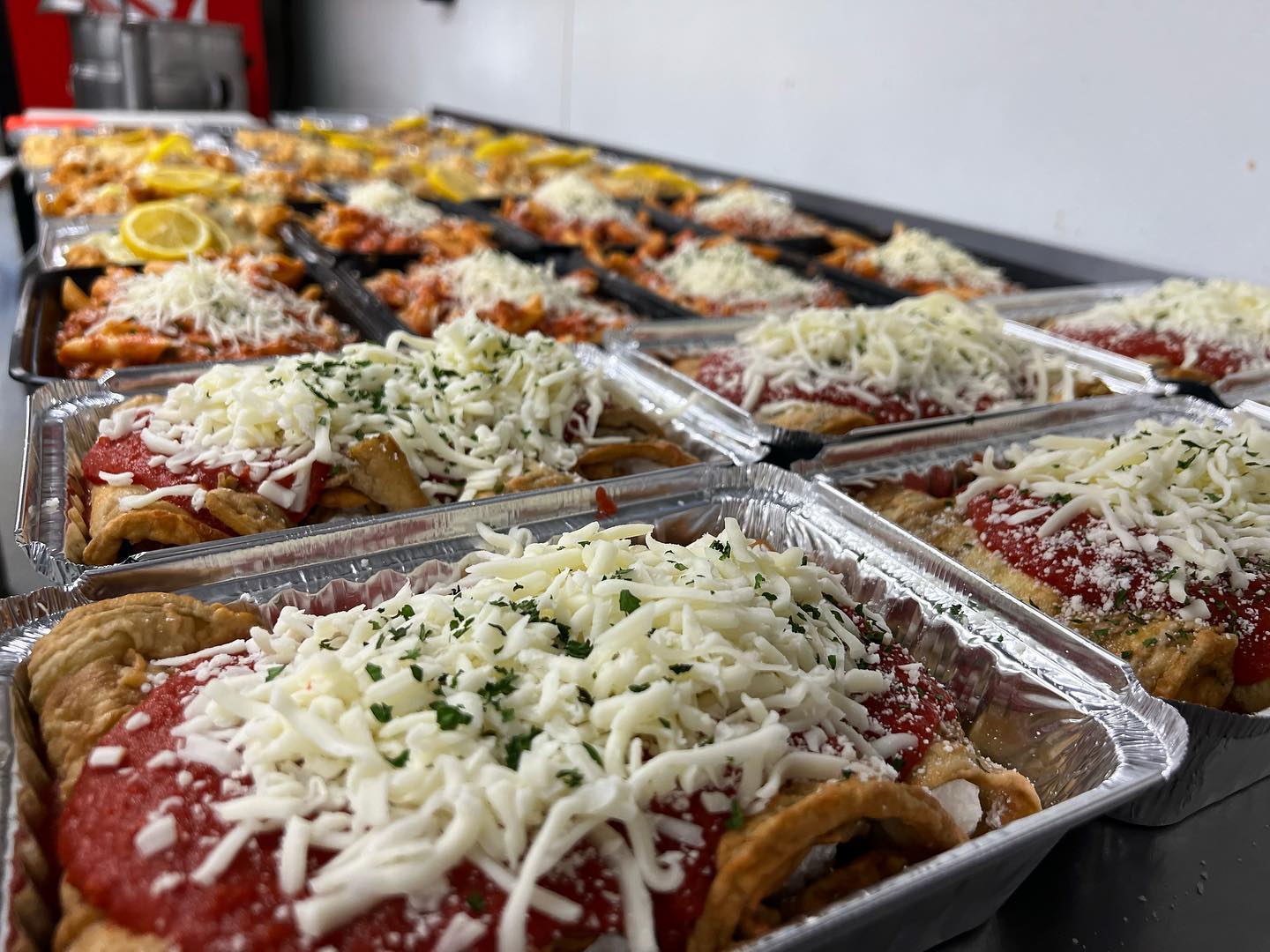 Trays of prepared Italian food for catering