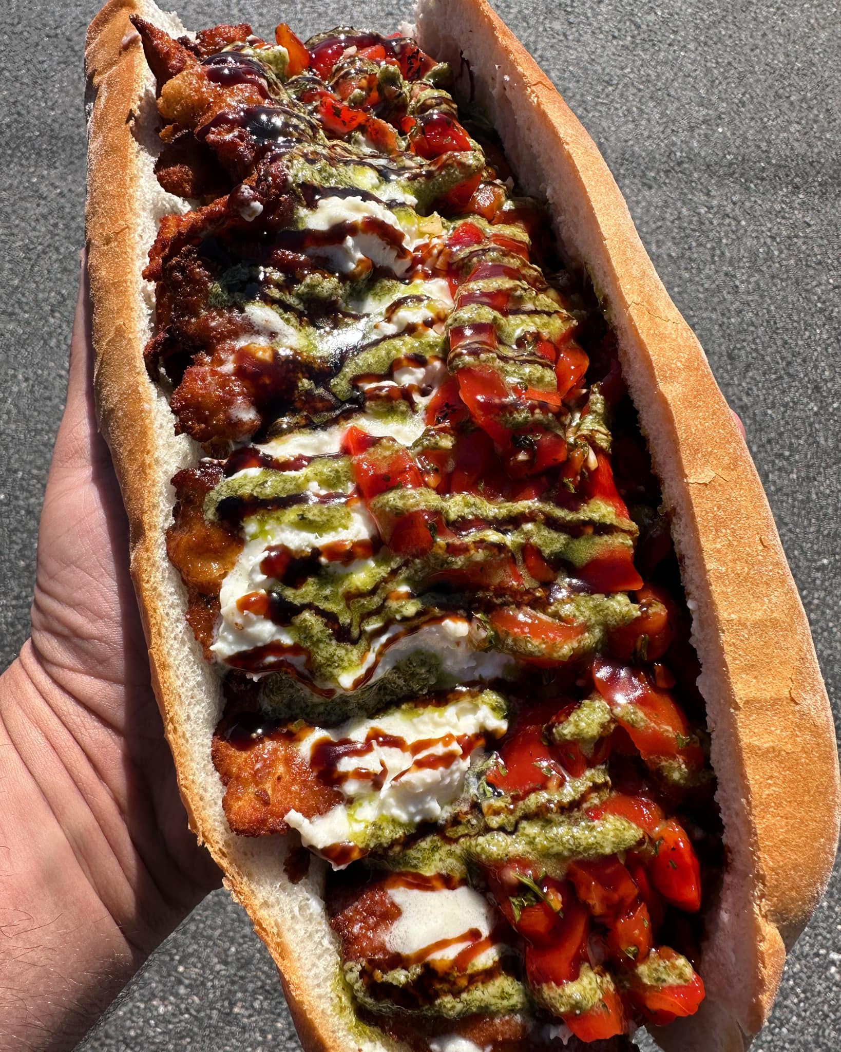 Loaded Italian deli sandwich on crusty bread